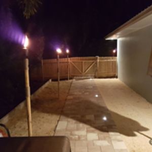 Back yard by pool, crushed coqueana and paver lighting