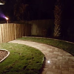 Walkway with sod and paver lighting